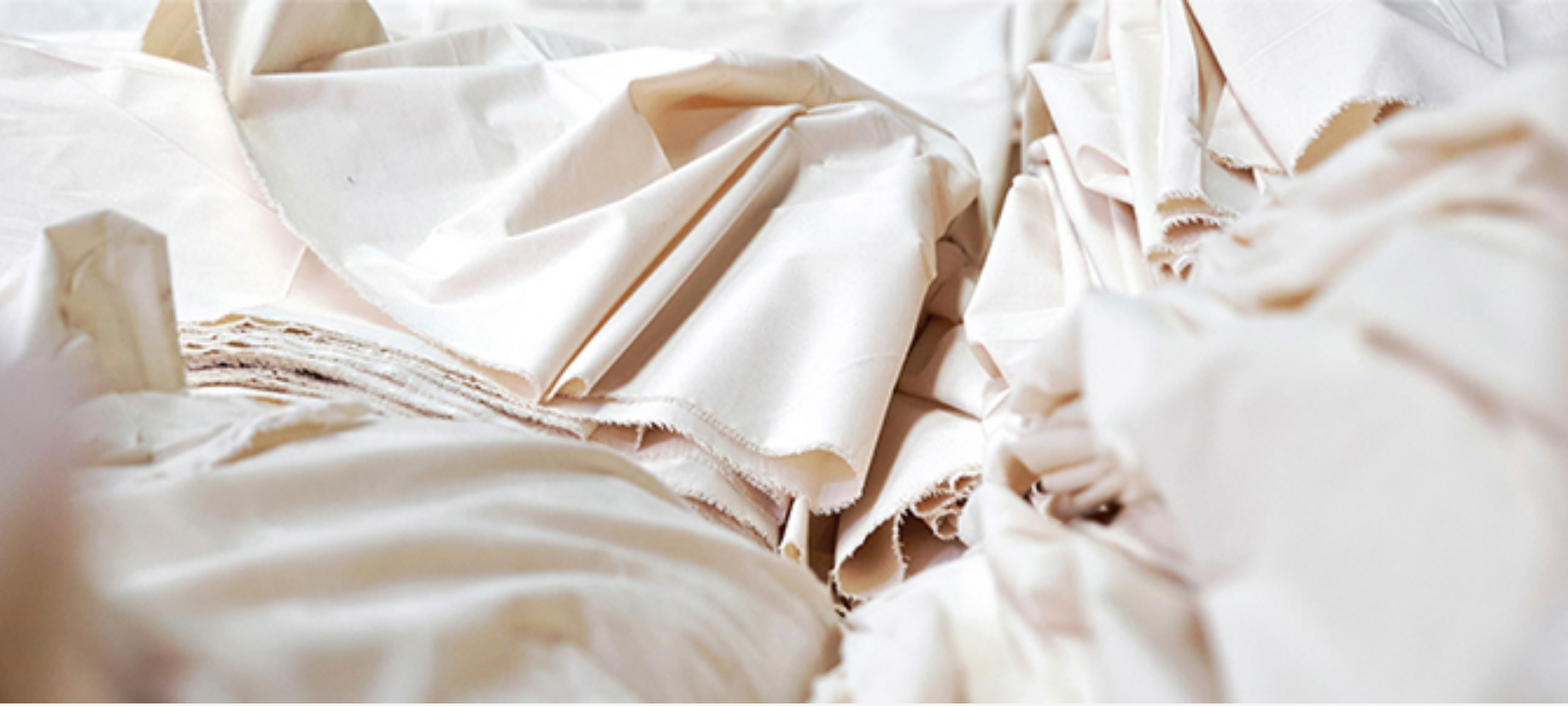 Natural cotton fabrics draped together